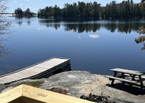 Birch Cottage view from deck, firepit, dock